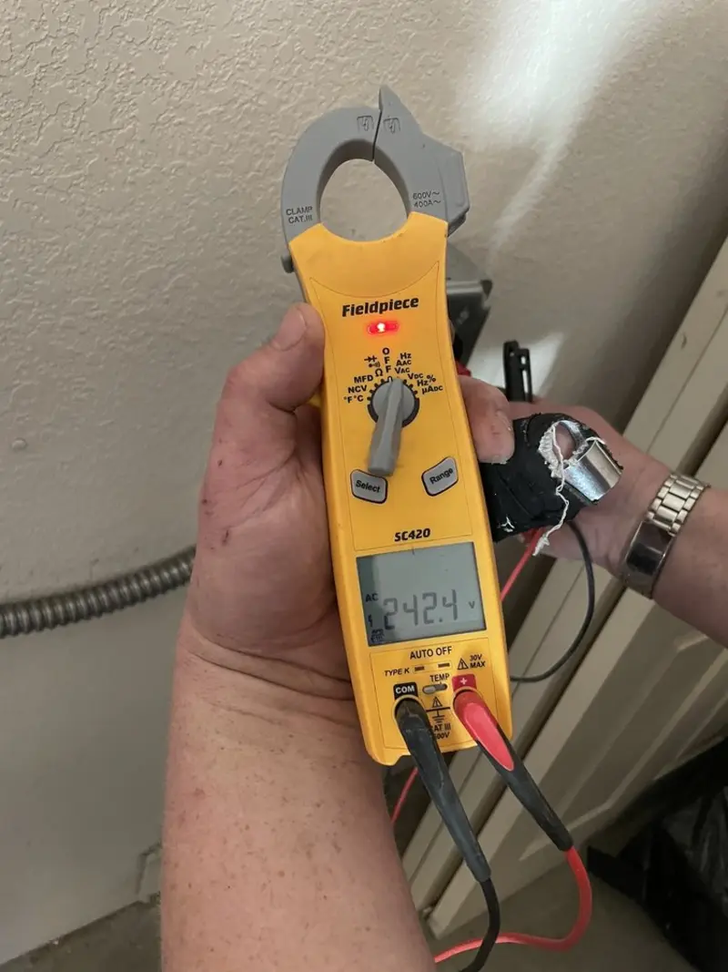 Voltage testing with clamp meter during Circuit Breaker Repair in Staunton